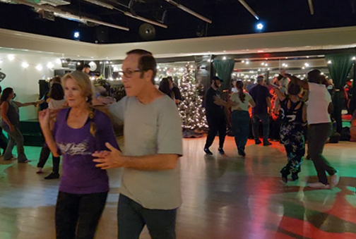 Social West Coast Swing dancers enjoying a dance night in Las Vegas