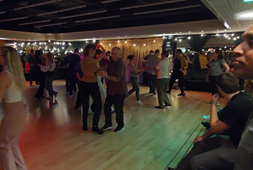 Social West Coast Swing dancing in Las Vegas crowd