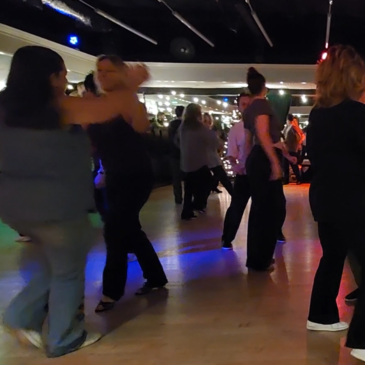 West Coast Swing social dance event in Las Vegas — dancers on the floor